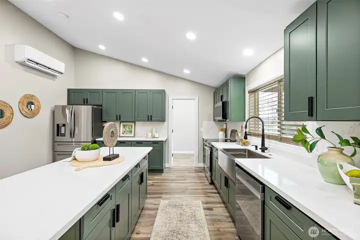 view to the large walk in pantry at the far end of the kitchen