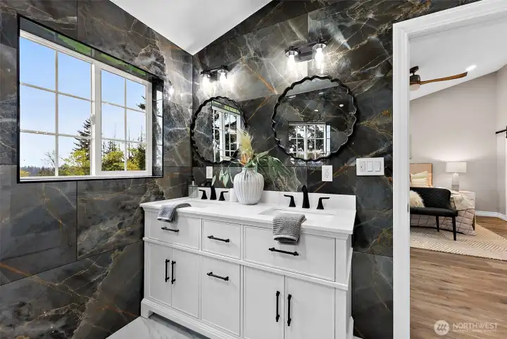 Vaulted ceilings, dual sinks and even a    smart fan with dimmers and bluetooth