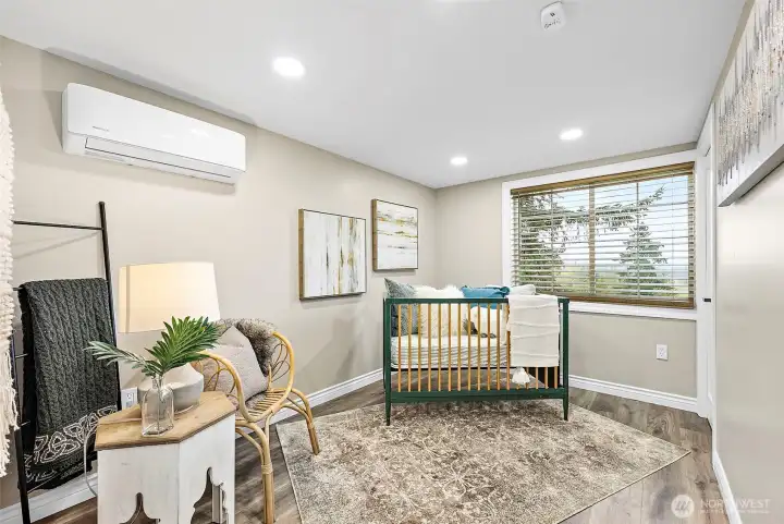 3rd bedroom on the main level also with its own mini-split and cable port.  Makes a great bedroom or office space too. (we moved out the queen bed/side table to stage it as a nursery).