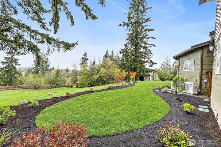 Lovely landscaped lawns and perennial plantings will offer year-round enjoyment