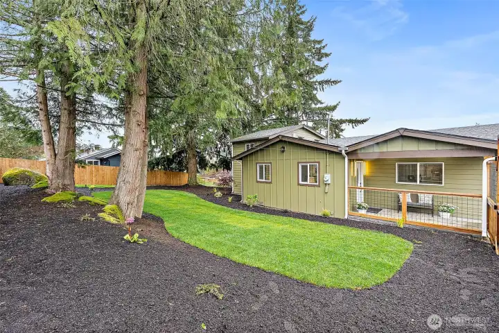 View to the front of the house inside the fence