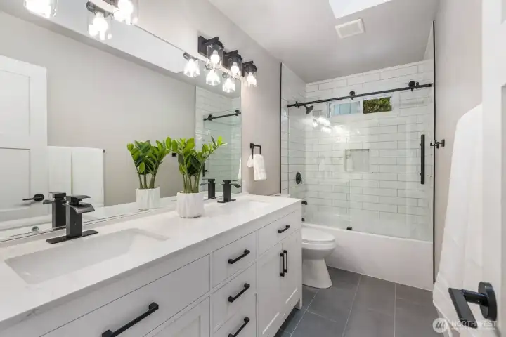 Remodeled full bath.