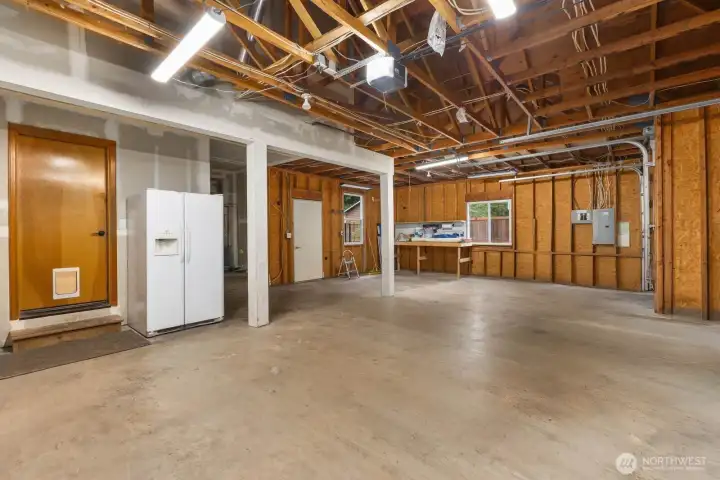 Expansive three car garage featuring generator ready capability