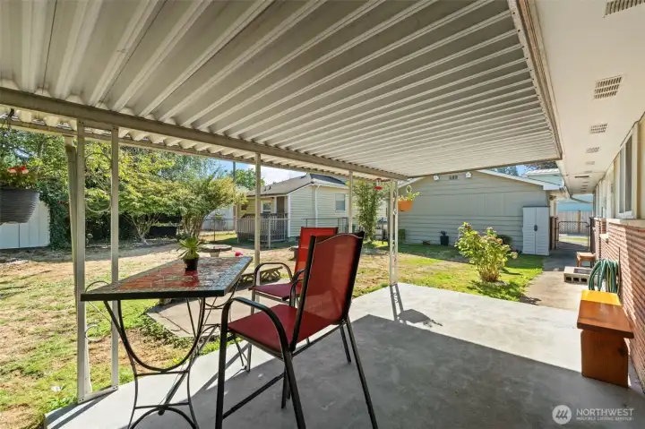 Patio looking towards garage and DADU