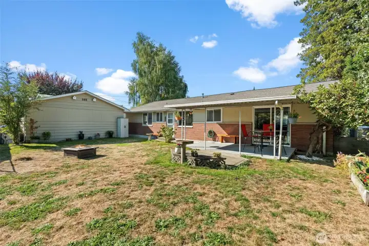 Corner of yard looking towards house and garage