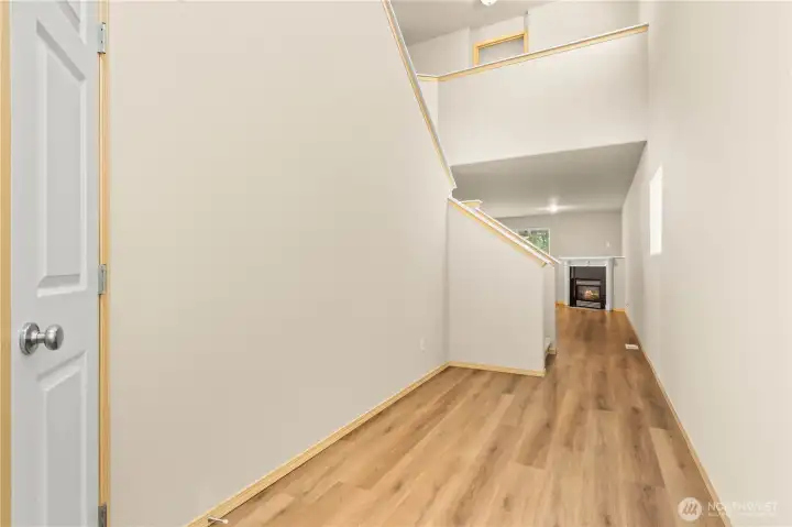ENTRY w/Laminate Floors. Looking up, notice the 2-Story Foyer!