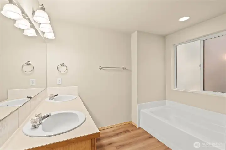 PRIMARY En Suite Bath w/Soaking Tub, Dual Sink Vanity and Separate Shower (to the R of the Tub, not shown)