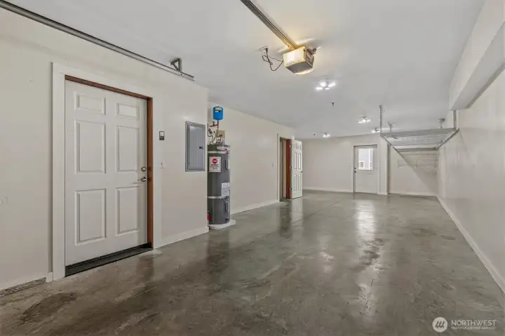 Large tandem garage with storage and built in shelving. Large tandem garage with storage and built in shelving.