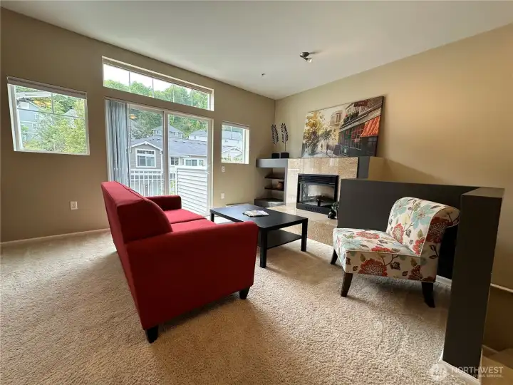 This view of the living room shows there is plenty of room to get around in the open floor plan.
