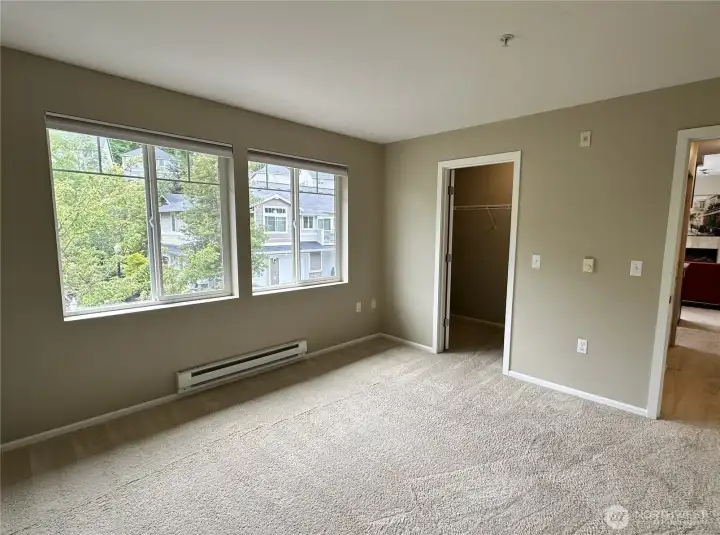 Another view of the bedroom showing the closet space.