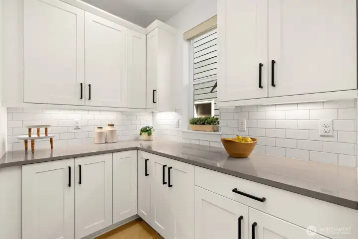Butler's pantry offers additional storage Butler's pantry offers additional storage