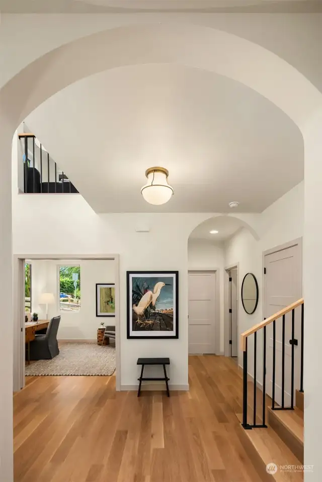 Oak Hardwood Floors, Arched Doorways, Custom Stair Railings