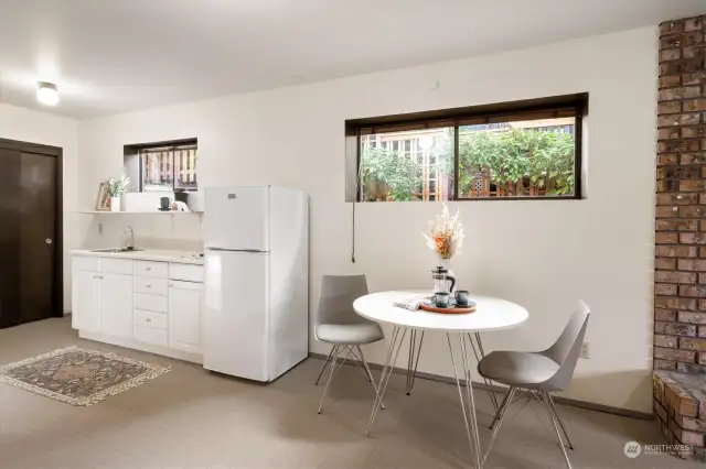 From the left: Prep a meal in the perfectly equipped kitchen, then enjoy it in the intuitive dining space, all warmed by the glow of the wood-burning fireplace.