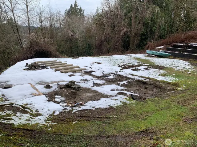 Lot 1 had an old mobile home on it. The access easement is just after this lot, turn left at the real estate sign.