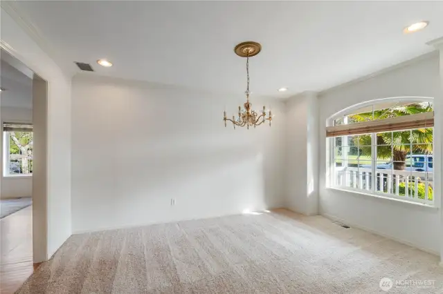 Dining area shown un-staged.