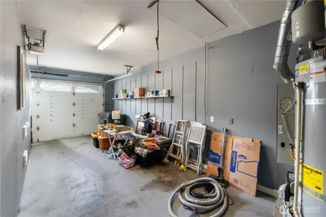 The garage supports one car. The second bay was previously converted to a finished room.