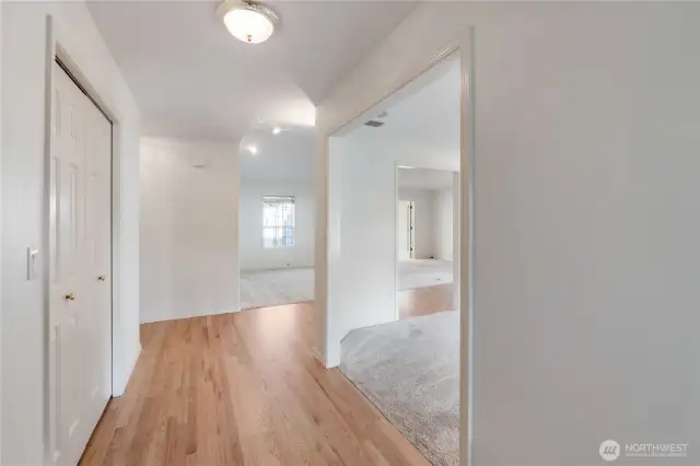 Come on in! Beautiful hardwoods greet you as you enter this unit. To the right opens to a formal dining area or perhaps a sun filled office!