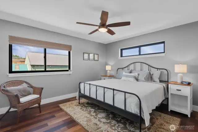 The apartment's bedroom fits a king sized bed with ease!
