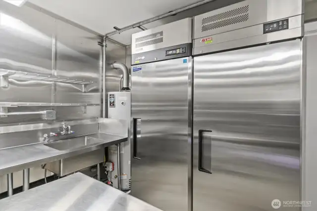 2 commercial grade freezers and electric water heater.