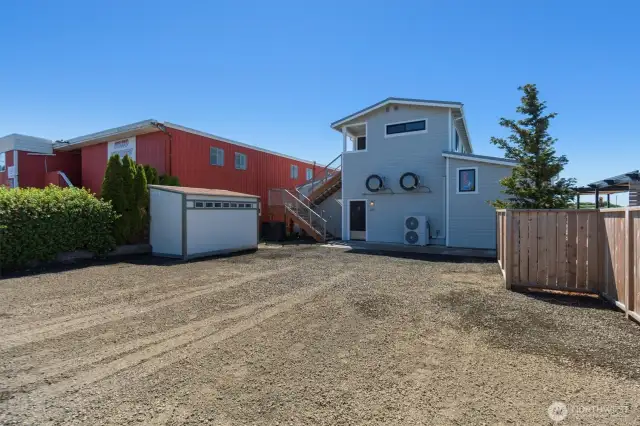 The rear of the building has parking for staff.