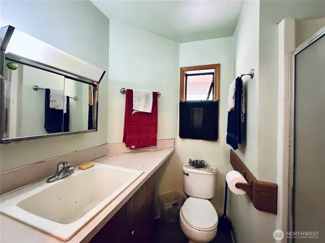 Bathroom off of the garage and laundry room of the single level home at 818 NW 349th St, La Center WA in Clark County.
