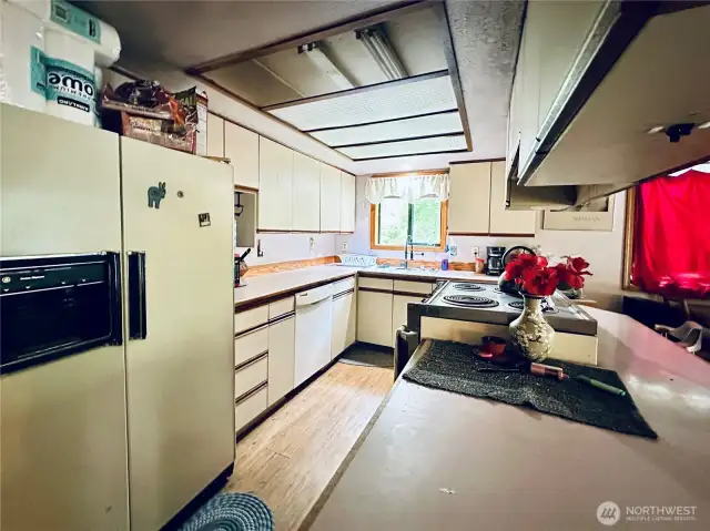 Kitchen from the family room of the single level home at 818 NW 349th St, La Center WA in Clark County.