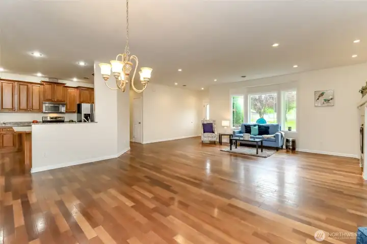 Large living room area w/option for dining area at chandelier.