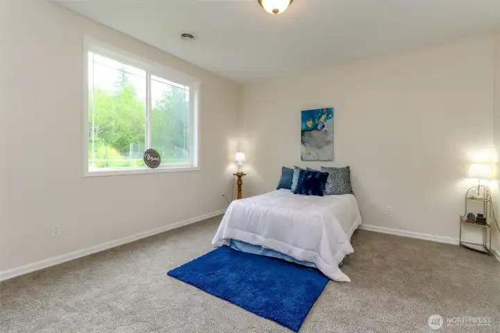 Primary bedroom with walk in closet