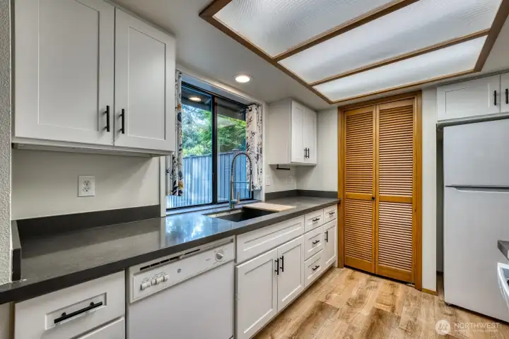 Unit A Kitchen - Recently Remodeled, New Cabinets, Countertops, Sink, Stove, Microwave, and Refrigerator