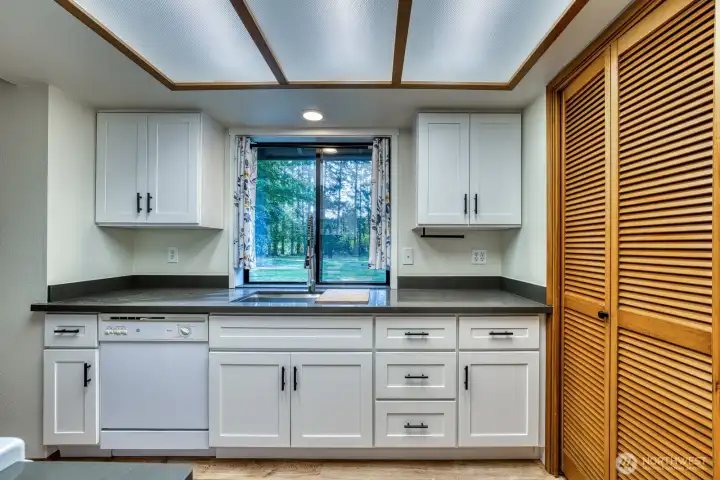Unit A Kitchen - Recently Remodeled, New Cabinets, Countertops, Sink, Stove, Microwave, and Refrigerator