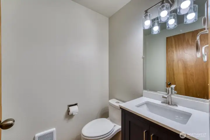 Unit A Half Bath off Garage and Laundry Room