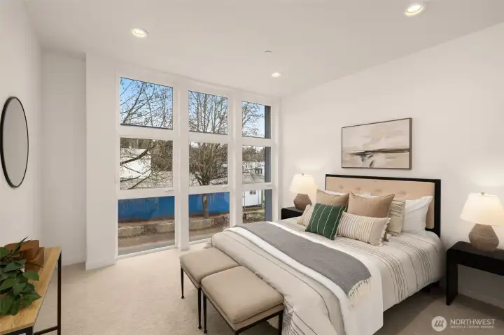 Primary bedroom upstairs features a walk-in closet and an ensuite.