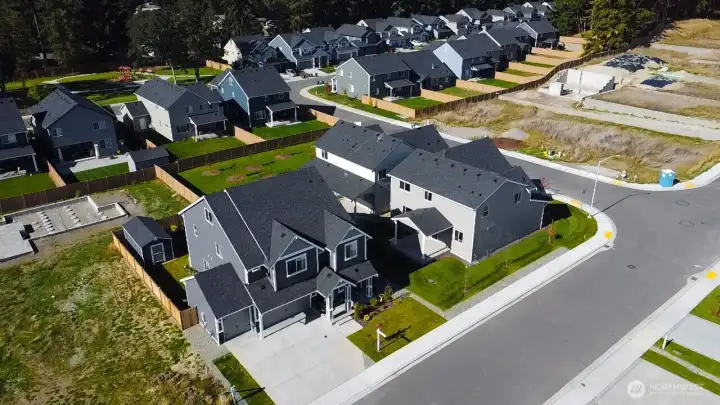 NICE AERIAL SHOWS THE GREEN BELT IN THE BACK TO THE RIGHT