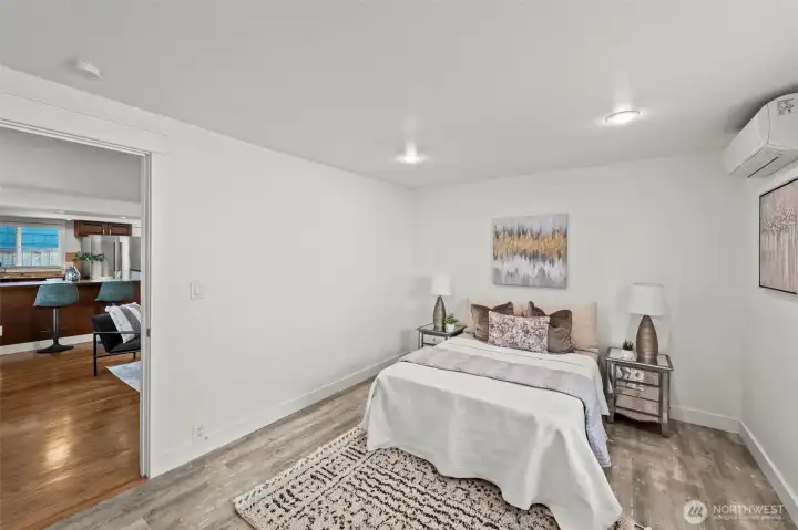 Primary bedroom off living room (towards the front of the house).