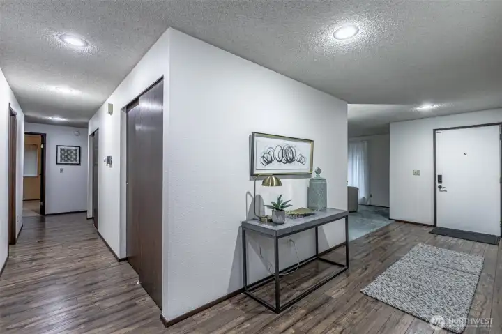 Foyer and hallway to bedrooms and baths