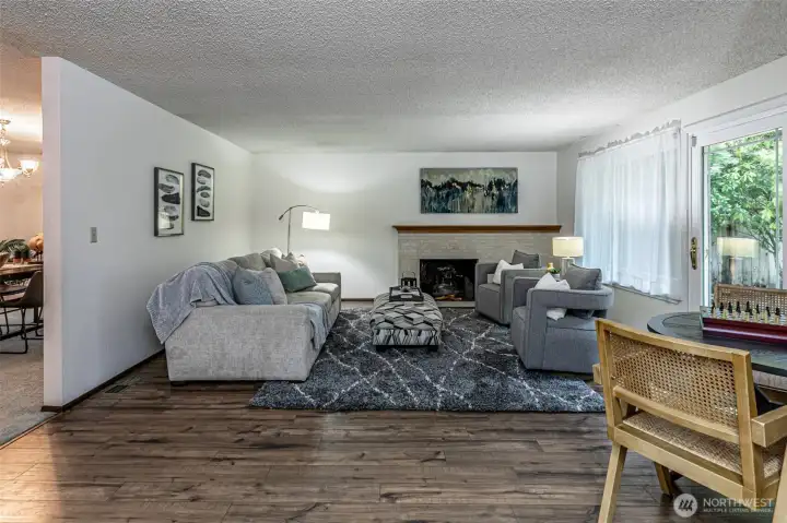 Family room is adjacent to the formal dining room and kitchen