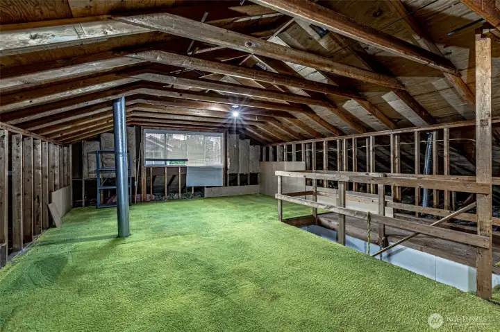 Unfinished loft/attic has plumbing stub. room to add bedrooms and bathroom