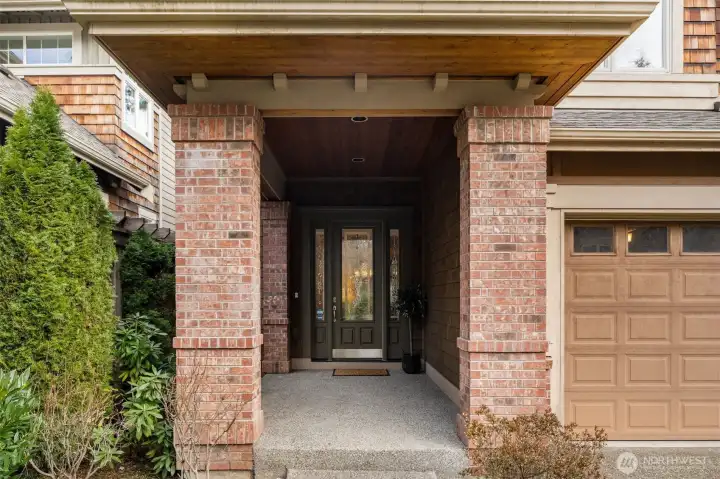 The covered front porch welcomes your guests.