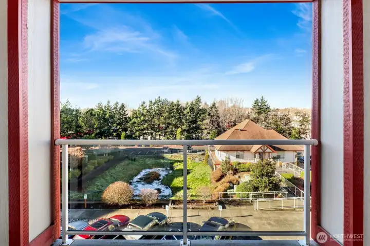 Dining-room lanai overlooking the complex—perfect for morning coffee or evening sunsets.
