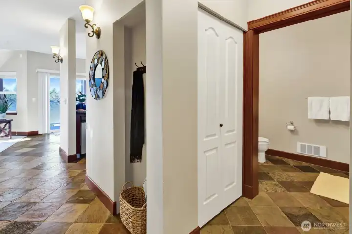 A niche in the hallway is just the place for your bags, umbrellas, dog leash and daily rush items!