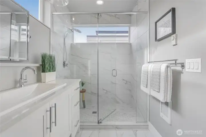 Clean, spa-inspired primary bath with modern detailing.