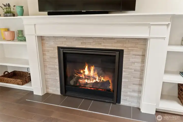 Custom built ins and tile for fireplace surround.