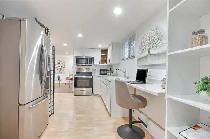 Large Kitchen in lower level ADU with newer appliances and a office work station!