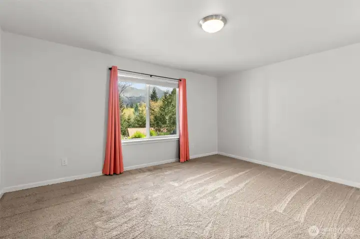 Master suite offers a walk-in closet and ensuite bath.