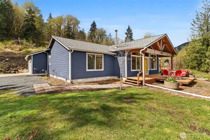 Garage, parking area, side of home.