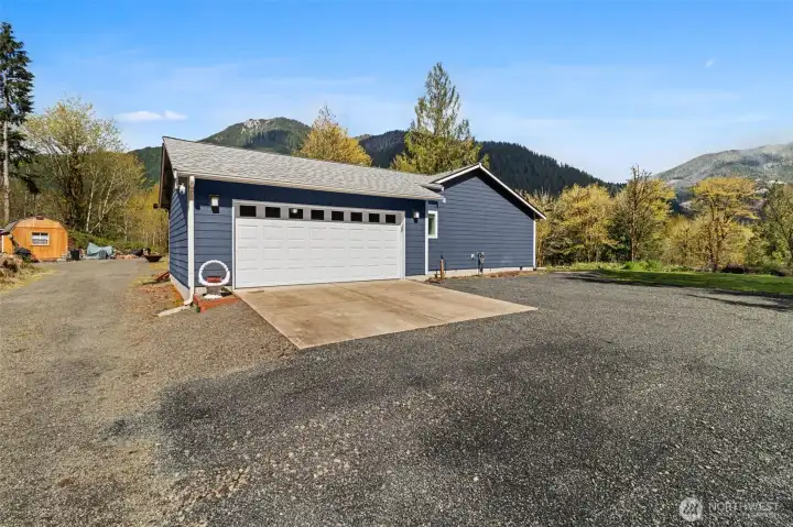 Circular drive - 2 car attached garage with man door to the patio & laundry room.