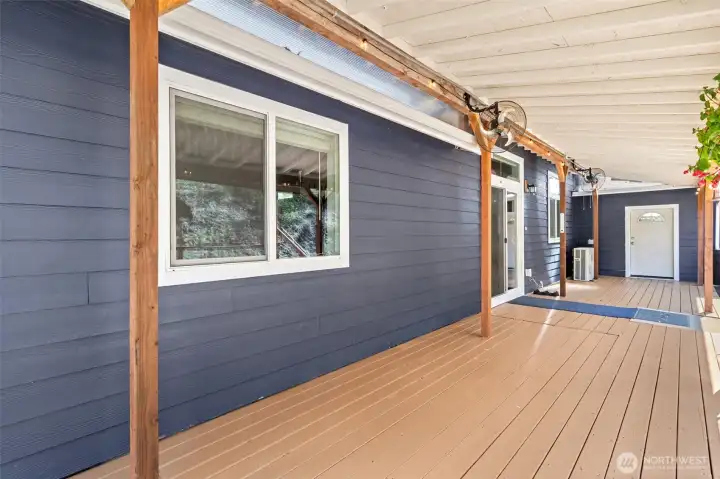 Inviting covered porch perfect for relaxing or entertaining!