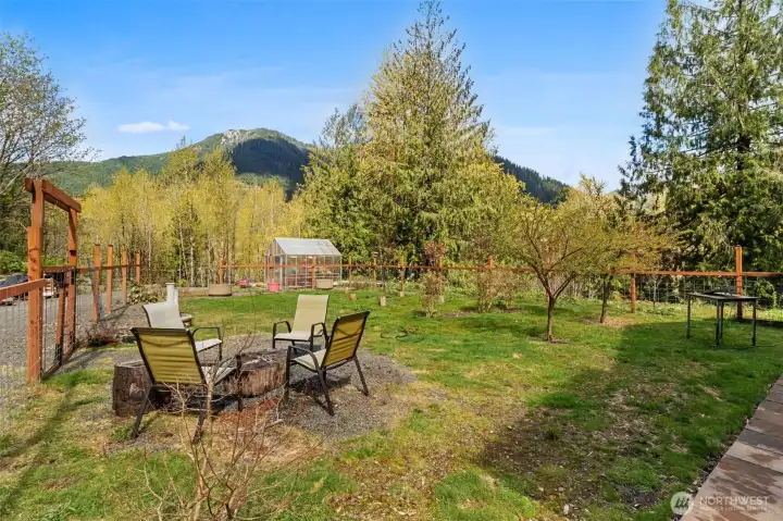 Gathering area in the fenced yard.