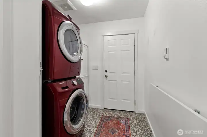 Laundry room - Washer, Dryer, Folding Table, Cabinets