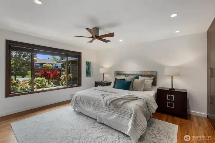 Main floor primary suite with custom built-ins
